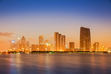 Fototapeta premium The skyline of modern urban architecture and the scenery of Taihu Lake in Suzhou, Jiangsu Province, China