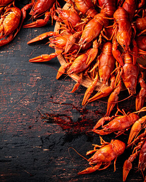 Boiled crayfish on a cutting board. 