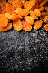 A bunch of delicious dried apricots on the table. 
