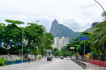 Driving on the Rio de Janeiro streets with Sugarloaf Mountain in the background.