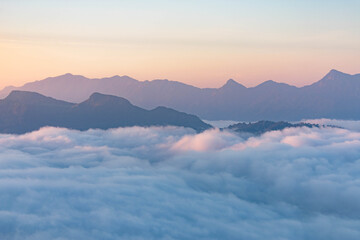 Morning atmosphere, mountains and clouds and natural fog.