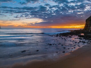 Sunrise at the seaside with clouds