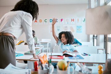 Question, school and education with a black girl student hand raised in a classroom to ask or answer her teacher. Kids, asking and learning with a young female child in class to study for growth