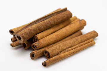 cinnamon sticks isolated on white