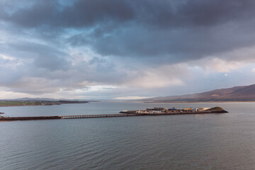 Obraz premium Tralee in Ireland from above, dramatic sky, beautiful clouds, sunset. High quality photo