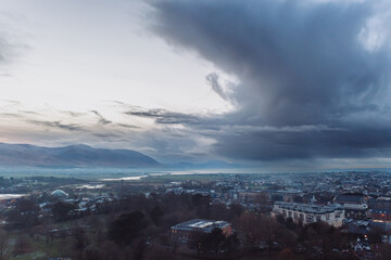 Tralee in Ireland from above, dramatic sky, beautiful clouds, sunset. High quality photo