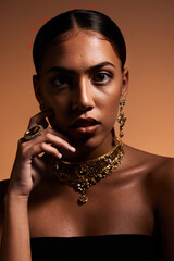 Fashion, jewellery and portrait of woman in studio for designer, luxury cosmetics and accessories....