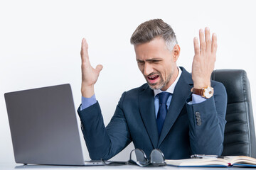 shouting overworked businessman sitting in business office