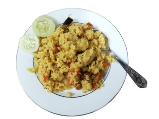 Bengali traditional Khichuri or hotchpotch on plate isolated with white background.