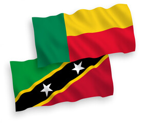 Flags of Federation of Saint Christopher and Nevis and Benin on a white background