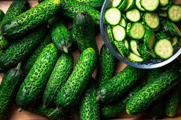 Pieces and whole ripe cucumbers. 