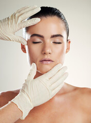 Patient, beauty and plastic surgery with hands on woman face for dermatology collagen cosmetics....