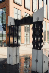 Water spray system for cooling in public place street at the boiling hot summer day. Water mist...
