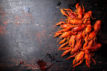 A bunch of boiled crayfish on the table. 