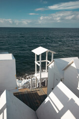 White empty beach huts on Procida island, Italy.