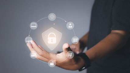Businessman secure access protecting personal data with virtual screen interfaces.