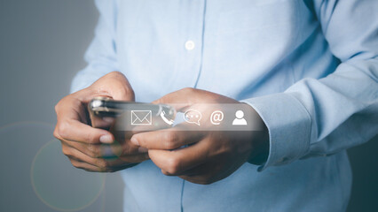 CONTACT US, Man using phone support hotline people connect customer service.