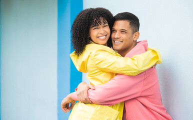 Couple, smile and hug in portrait, happy mockup with love and commitment, partner isolated on blue...