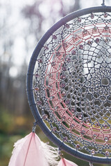 Handmade dream catcher with feathers threads and beads rope hanging