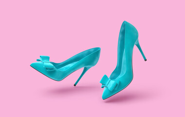 Turquoise velvet high heels shoes with bow decoration isolated on pink background. Clipping path included