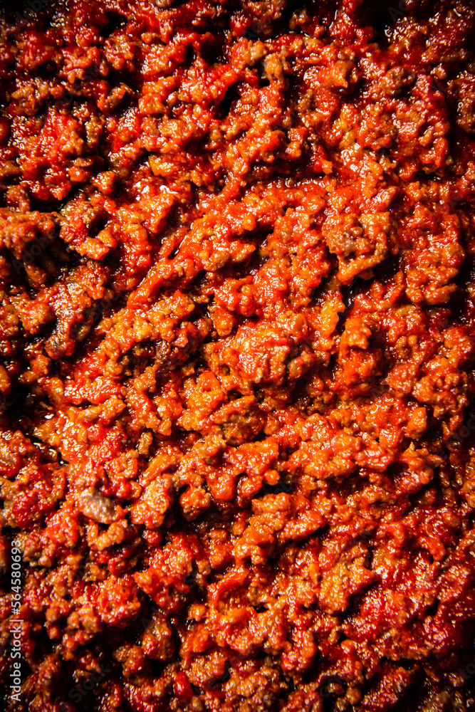 Sticker bolognese sauce. macro background. the texture of the bolognese sauce.