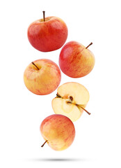Fresh whole red apple and slice falling in the air isolated on white background.