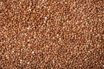 Top-down background of buckwheat. Close up of buckwheat grain