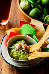 Guacamole, salsa and chips. Avocado dip, spread, or salad.  Avocados diced mixed with salsa, lemon and lime juices, cilantro, onions, jalapeños, tomatoes. Classic Tex-Mex or Mexican dip with salsa.