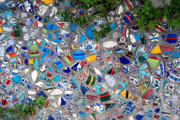 12.5.2022 - Istanbul, Turkey - Multicolored pieces of national ceramic tile on the concrete wall.