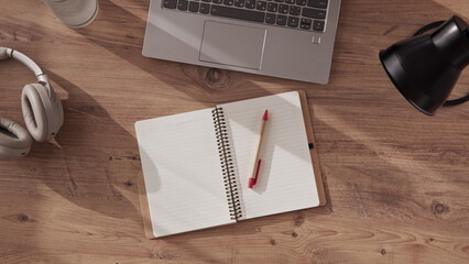 notebook with pen made of recyclable materials, cardboard, lies on desktop in office or home office...