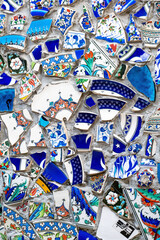 12.5.2022 - Istanbul, Turkey - Multicolored pieces of national ceramic tile on the concrete wall.