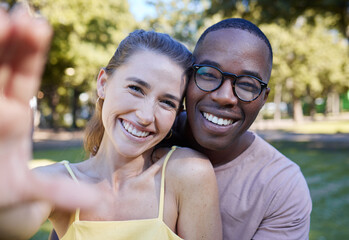 Love, smile and selfie with interracial couple at park for relax, social media and peace on...