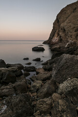 Sunset by the sea. long exposure. Galippoli, Canakkale Turkey. Fishermen's cove.	