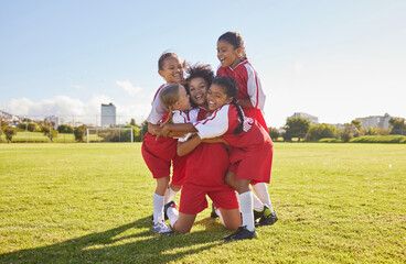 Success, soccer or winner children team hug in stadium for sports exercise, sport game or workout...