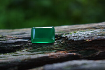 A green jade for making ornaments on the ground.