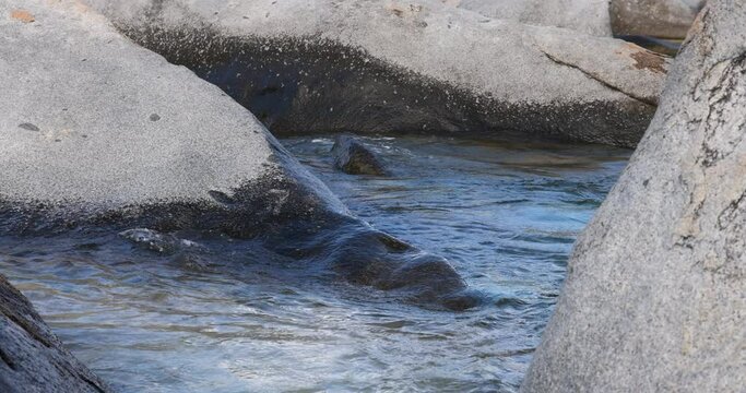 Virgin Gorda Caribbean ocean coast Baths rocks waves. British Virgin Islands. Cruise ship vacation destination. Geologic formation, the Baths, makes BVI major tourist destinations. Resort vacation.