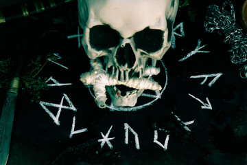 magic doll and White occult symbol on the witchcraft blackboard photo