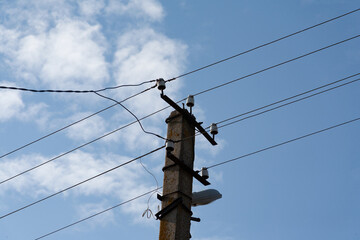 Power line against the blue sky