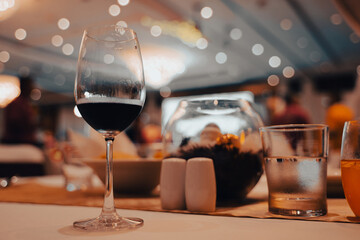 Wine glasses on dining table in luxury hotel banquet