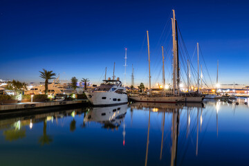 Fototapeta na wymiar Night landscape of the Port of Valencia with the yacht harbor, Spain.