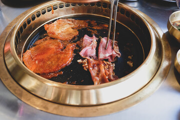 Korean cuisine, Grill meat pork korean barbecue traditional style in restaurant.