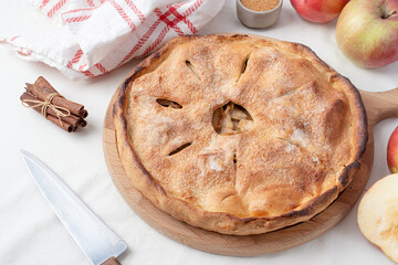 Homemade apple pie with fresh red apples