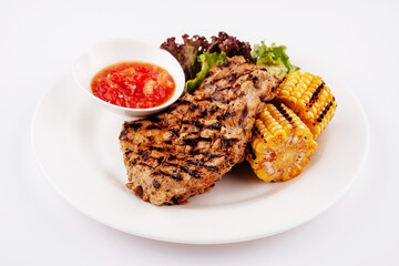grilled and barbecue fillet pork steak with corn
