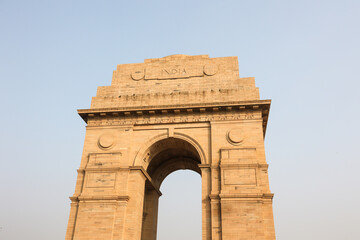 Fototapeta na wymiar The war memorial arch India Gate in the honor of the unknown martyrs. Vijay Chowk the Victory Square in New Delhi.