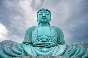 Fototapeta na wymiar Big Buddha (Daibutsu) at Wat Phra That Doi Phra Chan, Lampang Province, Thailand.