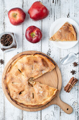 Homemade apple pie with fresh red apples