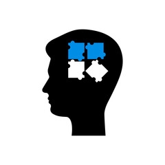 Unfinished puzzle in the human head. The concept of children with autism or Down syndrome.