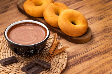 Pandequeso breakfast with hot chocolate drink - Colombian traditional food
