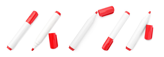 Set of bright red markers on white background, top view. School stationery