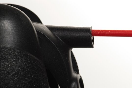 Nozzle and red straw from can of spray